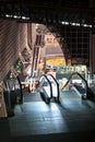 Empty escalator in Japanese shopping center of Kyoto railway station. High point of building at evening time. Japan