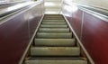 An empty escalator without people at the metro station on the red line of the Kiev metro. Close up of metal steps of an escalator Royalty Free Stock Photo