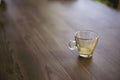 Empty espresso coffee drinking cup dirty on a wooden table