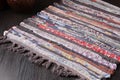Empty Fabric napkin for serving table with abstract pattern in oriental style on wooden table