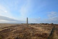 Empty Field with Malarrif Lighthouse in Iceland