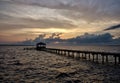 Fishing pier and dock at sunset Royalty Free Stock Photo