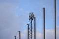 Empty Flag Pillars with GSM Antenna in Background