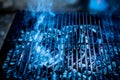 Empty flaming charcoal grill with open fire, ready for steak preparation barbecue concept with selective focus Royalty Free Stock Photo