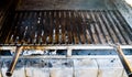 Empty flat barbecue BBQ grill grid in fireplace with charcoal. Royalty Free Stock Photo