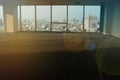 Empty floor and cityscape outside the window with sunset sky of modern city from window, Large Hall, Store, Royalty Free Stock Photo