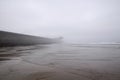 Empty foggy beach