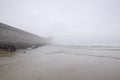 Empty foggy beach