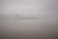 Empty foggy beach