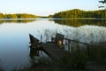Empty footbridge with a bench on a lake at sunrise Royalty Free Stock Photo