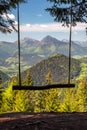 Empty forest swing with beautiful mountain view Royalty Free Stock Photo