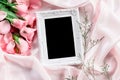 Empty frame with a bouquet sweet pink roses petal on sof Royalty Free Stock Photo