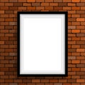 Empty frame on brown brick wall