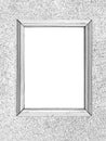 An empty frame hangs on the wall, a black and white pattern Royalty Free Stock Photo