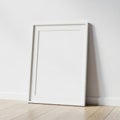 Empty frame leaning against wall Royalty Free Stock Photo