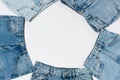 empty frame made from various blue jeans on white background, top view. Royalty Free Stock Photo