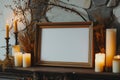 empty frame on a mantlepiece with candles beside Royalty Free Stock Photo