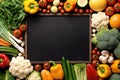 Empty frame in the middle of different vegetables lying on the table. Generative AI Royalty Free Stock Photo