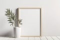 Empty frame mockup on empty neutral wall background. Royalty Free Stock Photo