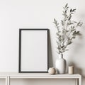 Empty frame mockup on empty neutral wall background. Royalty Free Stock Photo