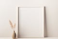 Empty frame mockup on empty neutral wall background. Royalty Free Stock Photo