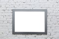 Empty frame from a painting on a white brick wall. White place mock up Royalty Free Stock Photo