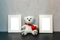 Empty frame and a teddy bear toy mock-up Royalty Free Stock Photo