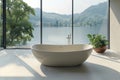 Empty freestanding bathtub against large windows. Home decor ideas in modern bathroom design