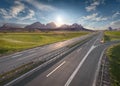 Empty freeway through vastness at idyllic sunrise Royalty Free Stock Photo