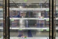 Empty freezer shelves at Publix featuring frozen food shortage including organic vegetables, pizza, and junk food during Covid-19