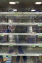 Empty freezer shelves at Publix featuring frozen food shortage including organic vegetables, pizza, and junk food during Covid-19