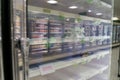 Empty freezer shelves at Publix featuring frozen food shortage including organic vegetables, pizza, and junk food during Covid-19