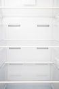 Empty fridge inside. Vertical orientation Royalty Free Stock Photo