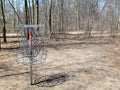 Empty Frisbee Golf Basket in Woods