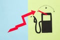 empty fuel pump, creative dashboard on pink-blue background, red arrow