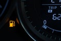 Empty fuel warning light in car dashboard. Fuel pump icon. gasoline gauge dash board in car with digital warning sign of run out o