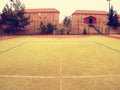 Empty gate. Outdoor football or handball playground plastic light green surface Royalty Free Stock Photo