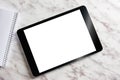 Empty generic tablet pc on top of white marble