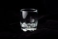 Empty glass on black velvet Royalty Free Stock Photo