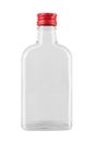 Empty glass bottle with a red cap from a medicine or an alcoholic drink of vodka, whiskey isolated on a white background. File Royalty Free Stock Photo