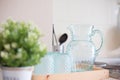 Empty Glass bottle of water with drinking glass  on the table in kitchen Royalty Free Stock Photo