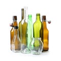 Empty glass bottles and jar on white. Recycling problem Royalty Free Stock Photo