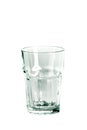 An empty glass glass and a carafe for water stand on a white background Royalty Free Stock Photo