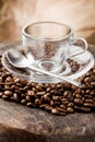 Empty Glass Cup on Coffee Beans Royalty Free Stock Photo