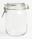 Empty glass food preserving jar Royalty Free Stock Photo