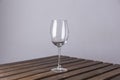 empty glass goblet on a wooden table Royalty Free Stock Photo