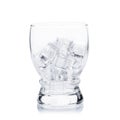 empty glass with ice cubes on white background Royalty Free Stock Photo