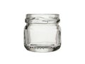 Empty glass jar for canned food and jam, low shape. Isolated on a white background Royalty Free Stock Photo