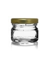 Empty glass jar closed by a metal cover with reflection on a white background Royalty Free Stock Photo