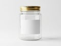 Empty glass jar with gold lid on white background Royalty Free Stock Photo